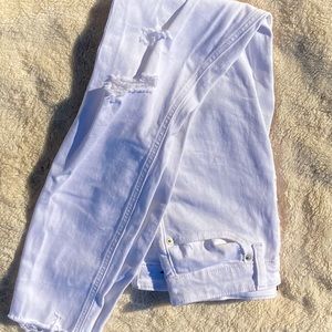 White ripped jeans, never worn. From gap.